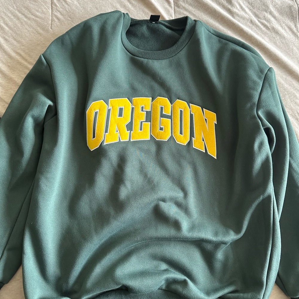 Green Crewneck Sweater with Yellow Collegiate Lettering